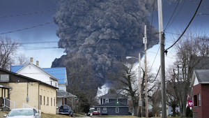 A black plume rises over East Palestine, Ohio, after the incineration of chemicals from a derailed Norfolk Southern train.